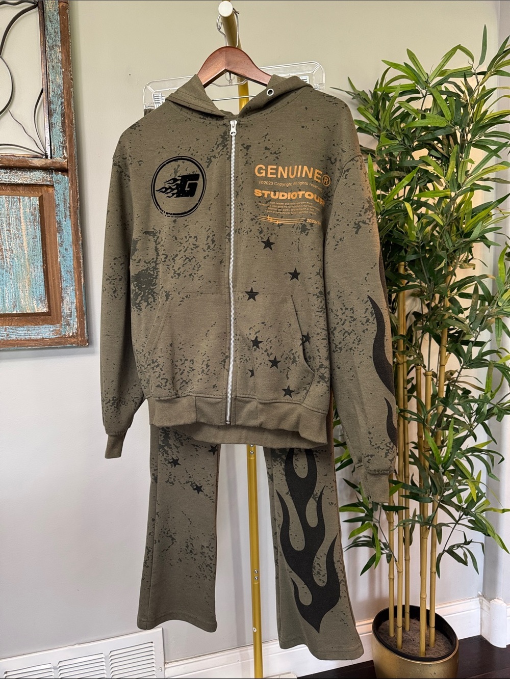 Genuine Studio Olive Graphic Zip Hoodie with Gold and black velour print